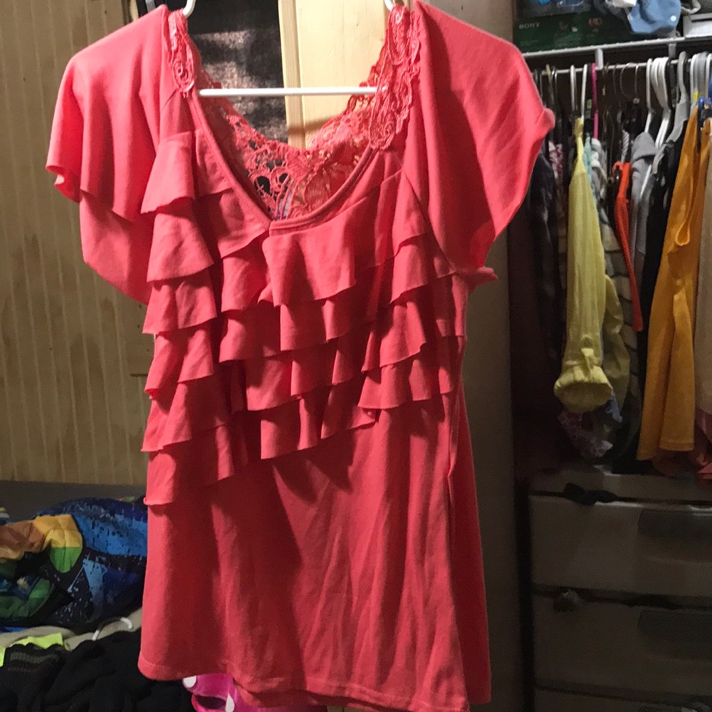 Pink ruffled top with lace back
